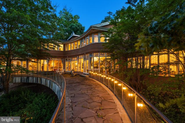 a view of swimming pool with seating space