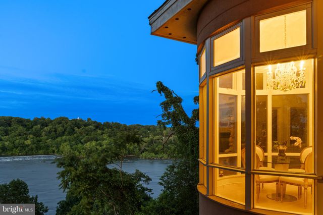a view of a house with a window and balcony