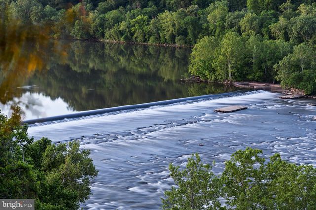 a view of a lake with a city