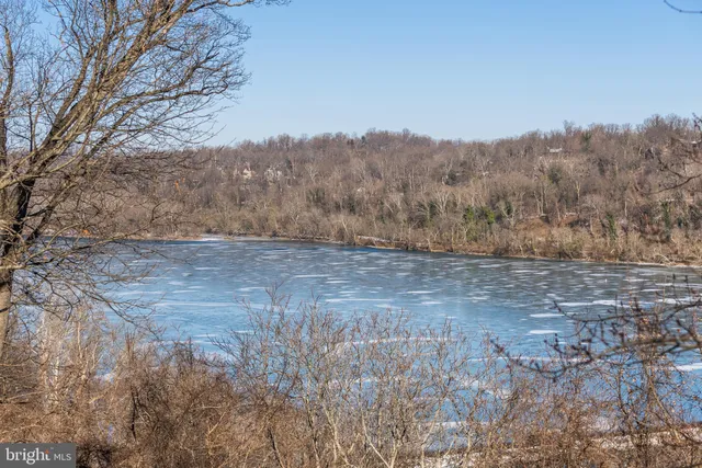 a view of a lake from a balcony