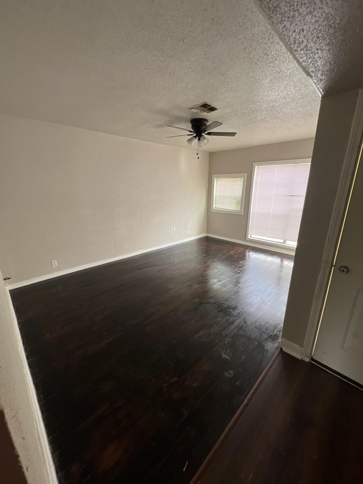 9306 St Lo Road Houston, TX 77033 - Photo 3 of 13 Living room