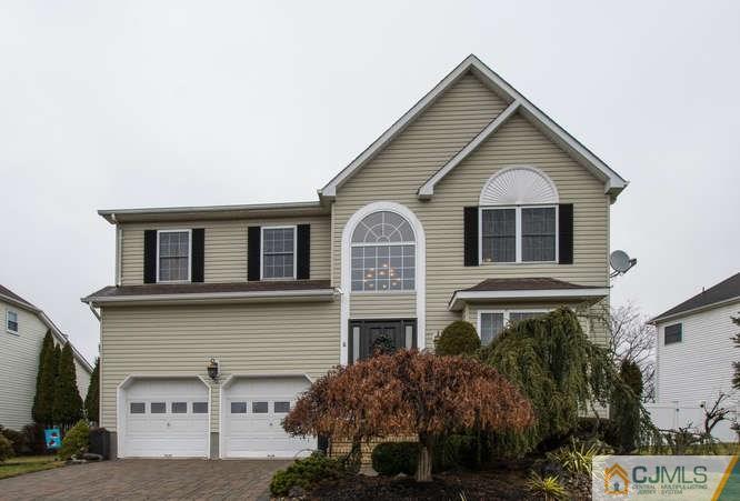 52 Lexington Road Monmouth Junction, NJ 08852 - Photo 1 of 15 a front view of a house with a yard