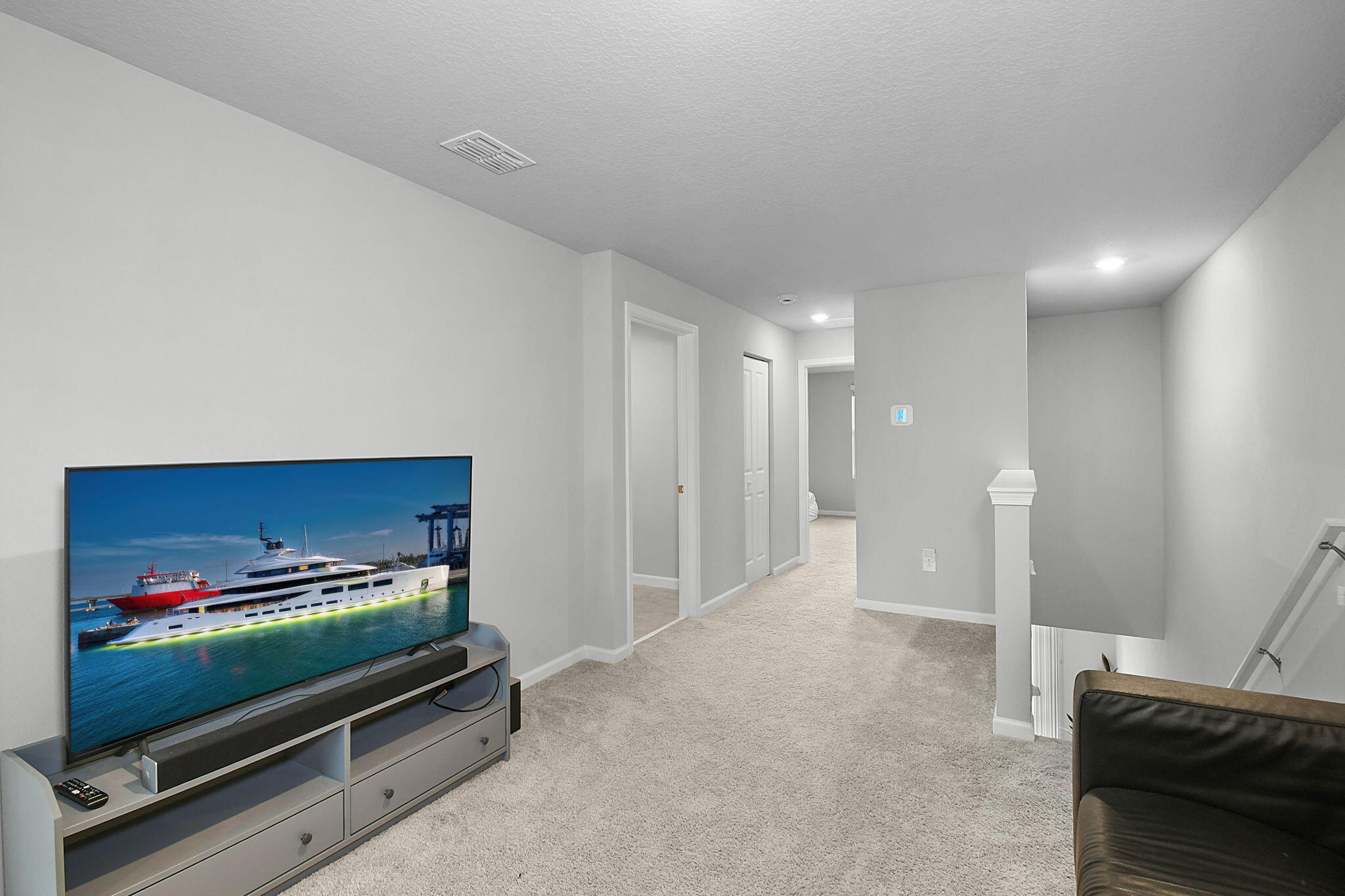 5766 Southeast Edgewater Circle Stuart, FL 34997 - Photo 19 of 46 Separates Primary from Guest Bedrooms