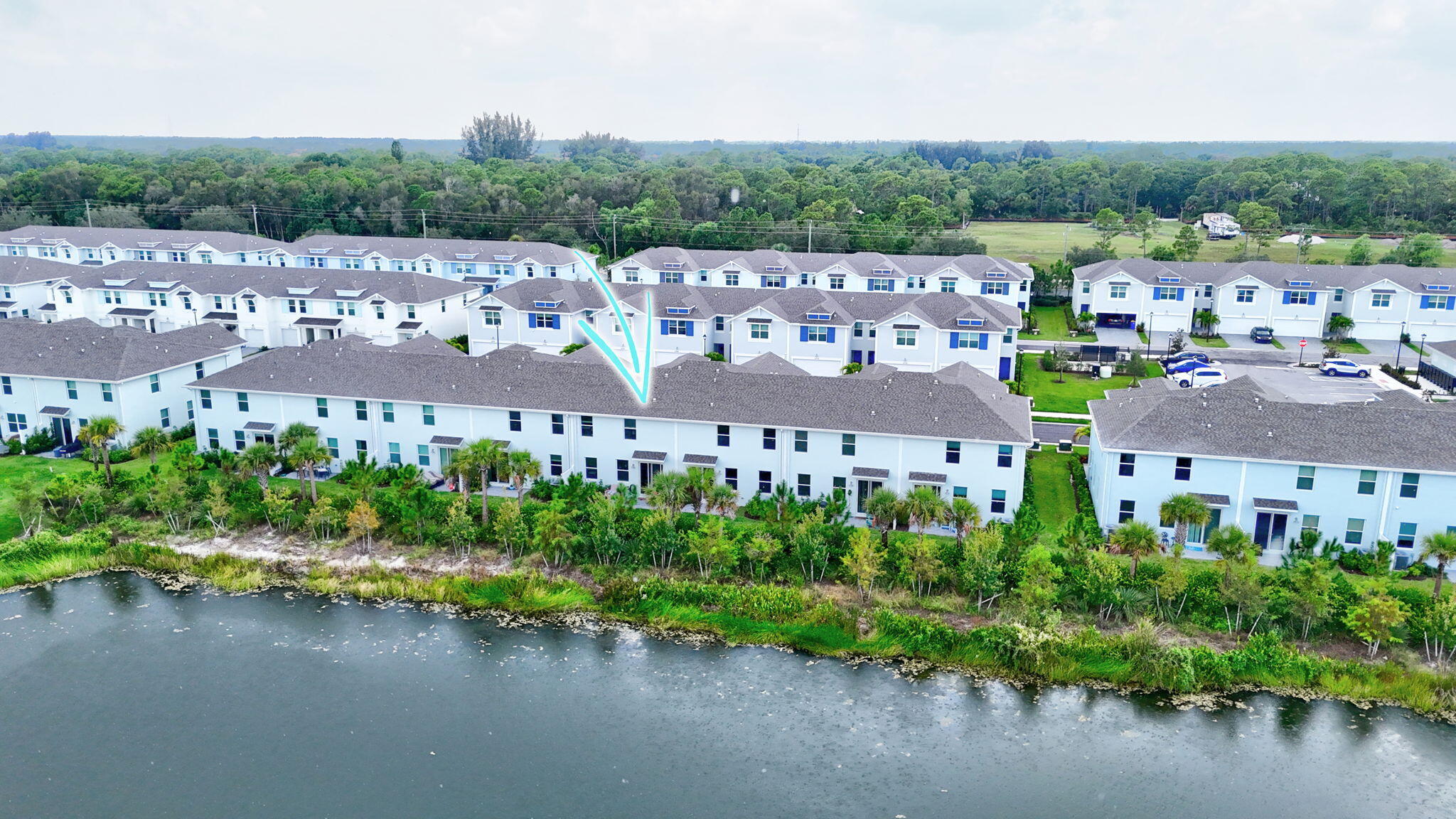 5766 Southeast Edgewater Circle Stuart, FL 34997 - Photo 41 of 46 Lake and rear of home