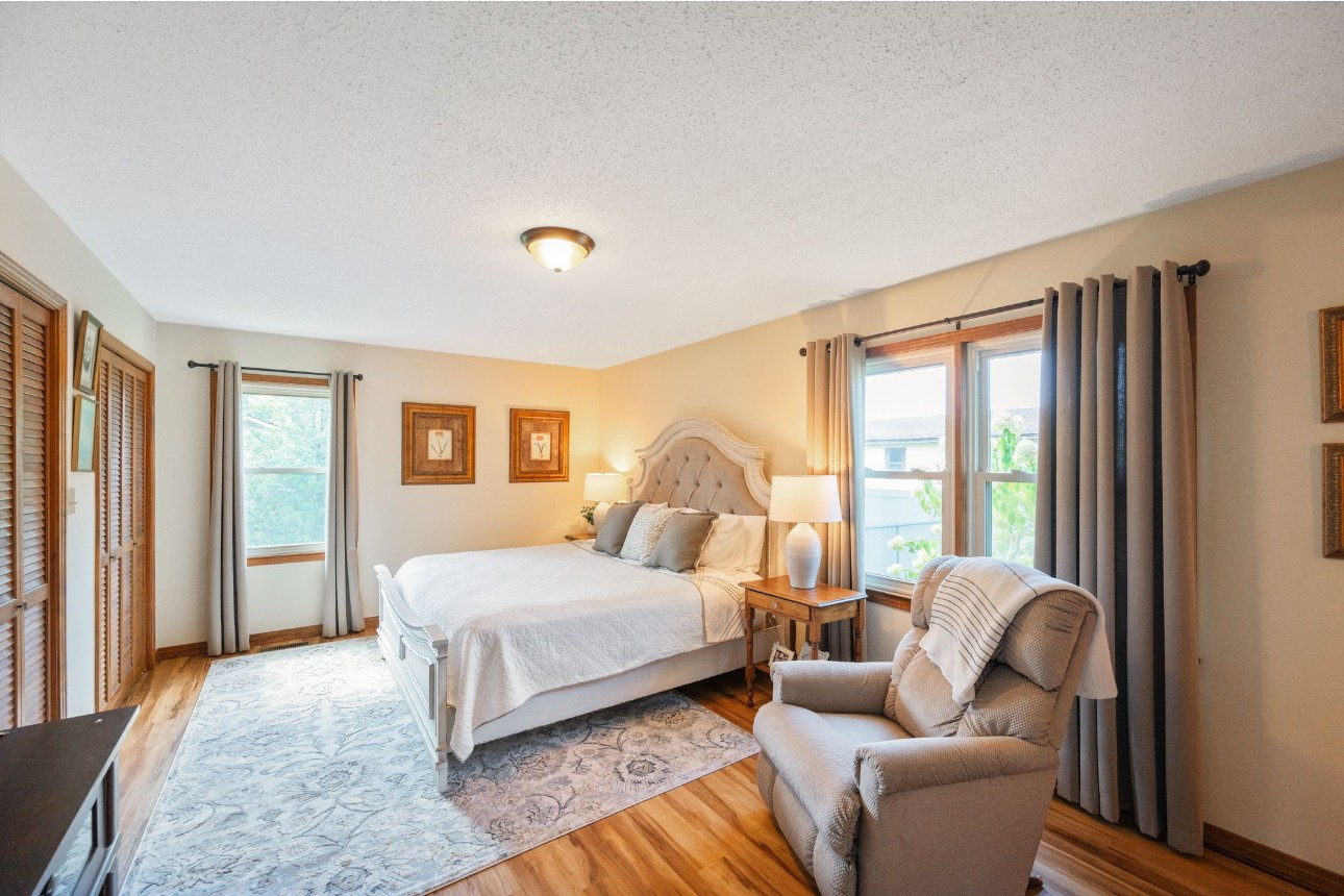 533 Taylor Street Bruceton, TN 38317 - Photo 15 of 22 a bedroom with a bed and glass window