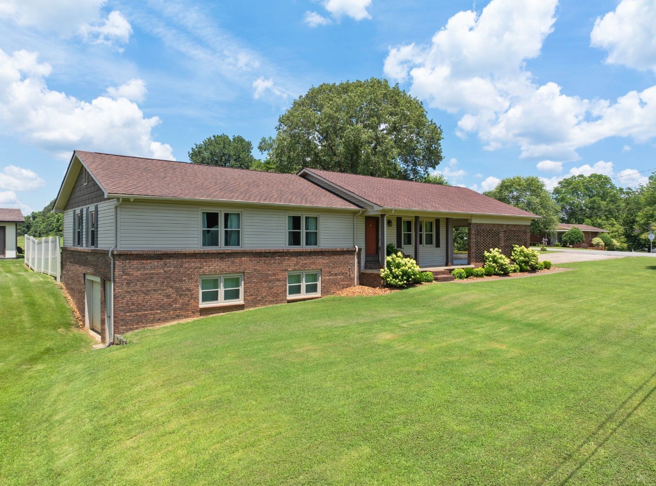 533 Taylor Street Bruceton, TN 38317 - Photo 2 of 22 a view of a house with a yard and sitting area