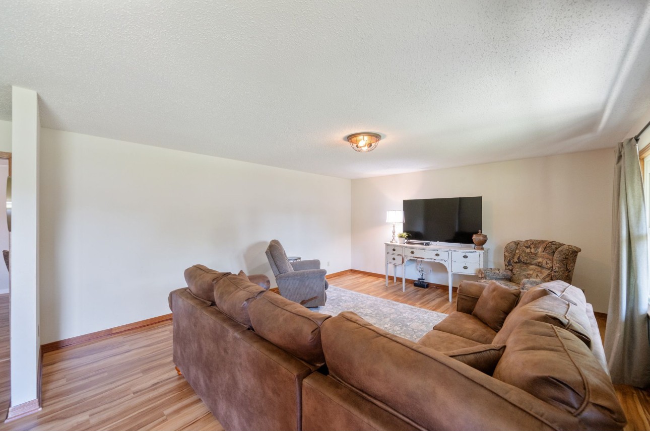 533 Taylor Street Bruceton, TN 38317 - Photo 10 of 22 a living room with furniture and a flat screen tv