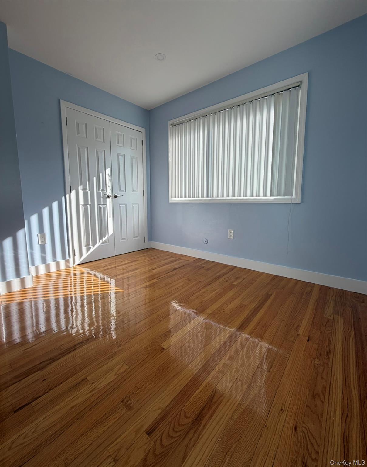 60 Medallion Road Kiamesha Lake, NY 12751 - Photo 35 of 44 a view of an empty room with wooden floor and a window