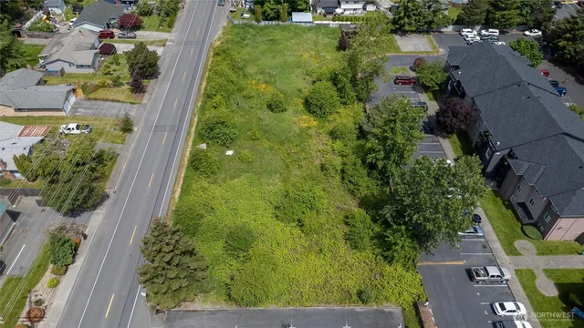 an aerial view of residential house with an outdoor space