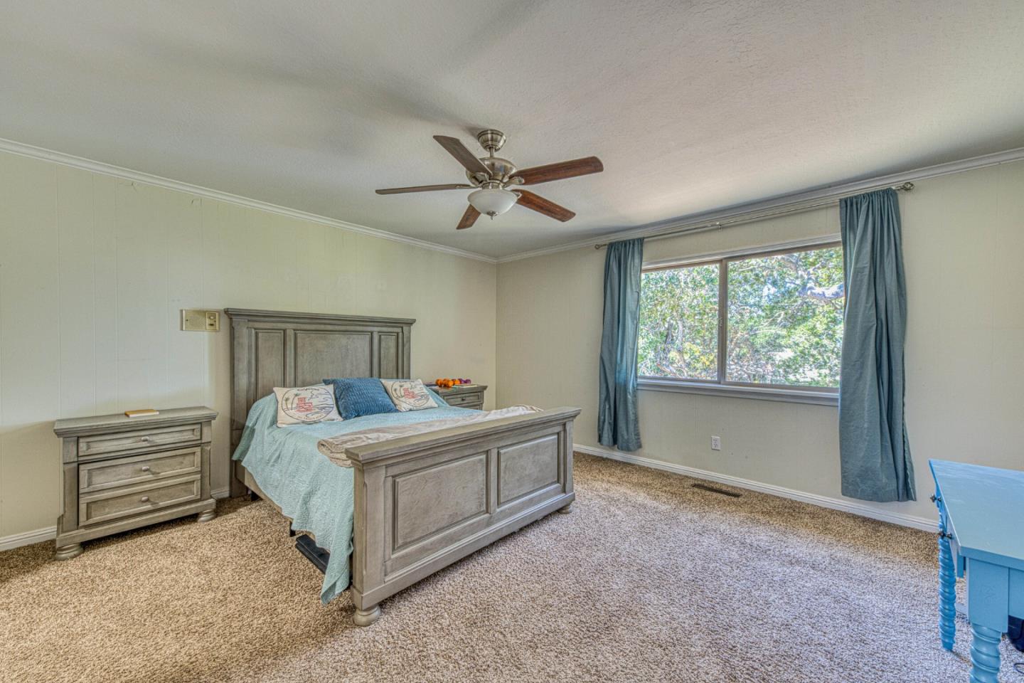 394 Mesa Road Salinas, CA 93908 - Photo 25 of 53 a bed room with a bed and a ceiling fan
