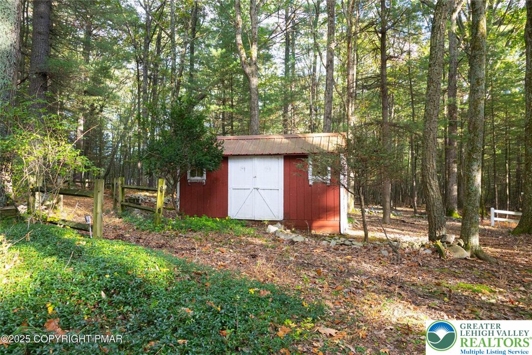 229 Deer Path Kunkletown, PA 18058 - Photo 11 of 29 a backyard of a house with lots of green space