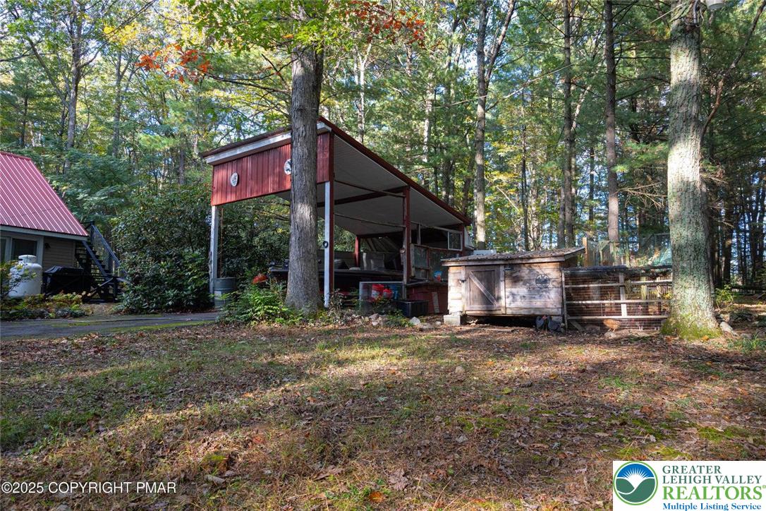229 Deer Path Kunkletown, PA 18058 - Photo 13 of 29 a view of a house with a yard and sitting area