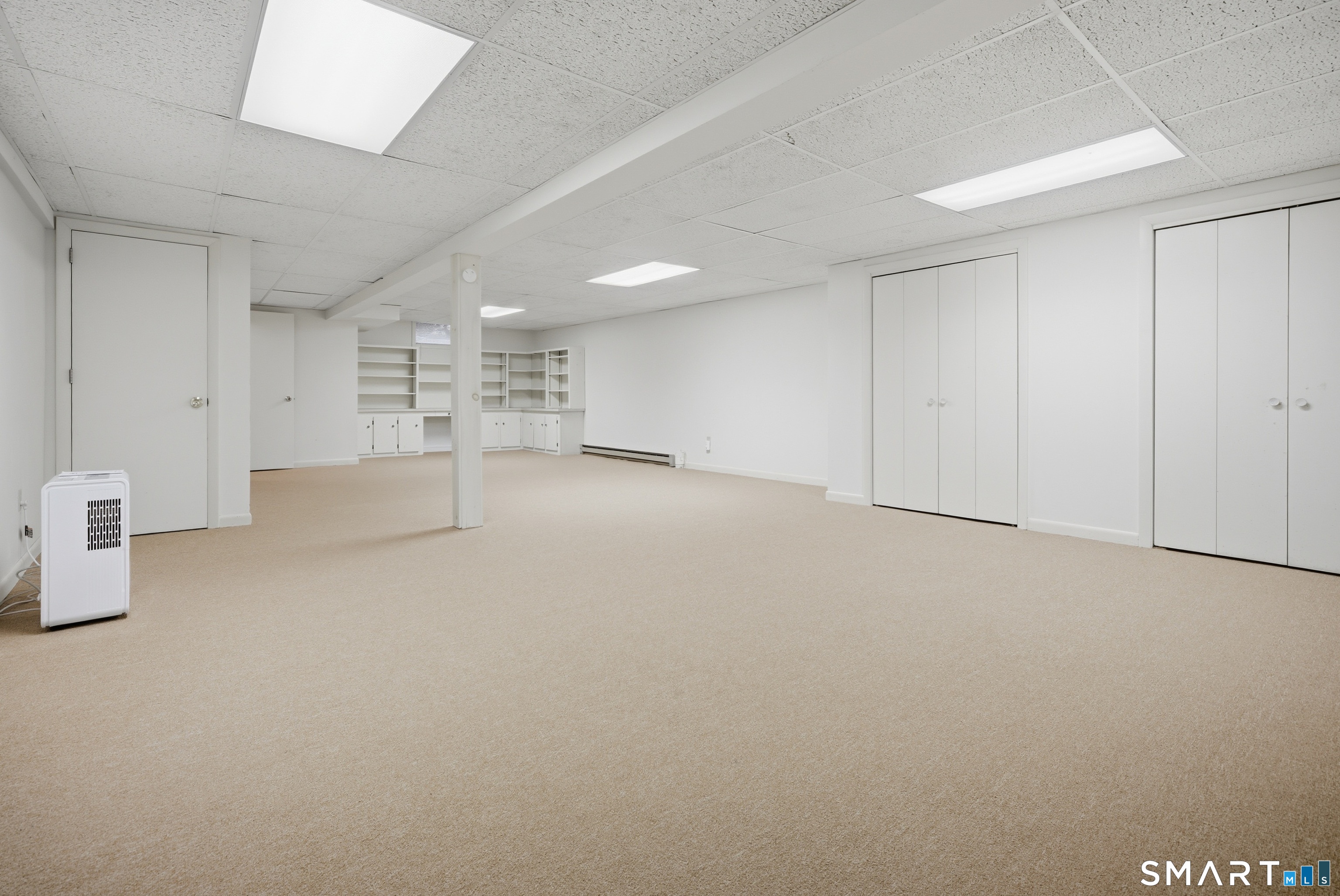 449 South Main Street, Unit 90 Manchester, CT 06040 - Photo 33 of 39 a view of an empty room with a window