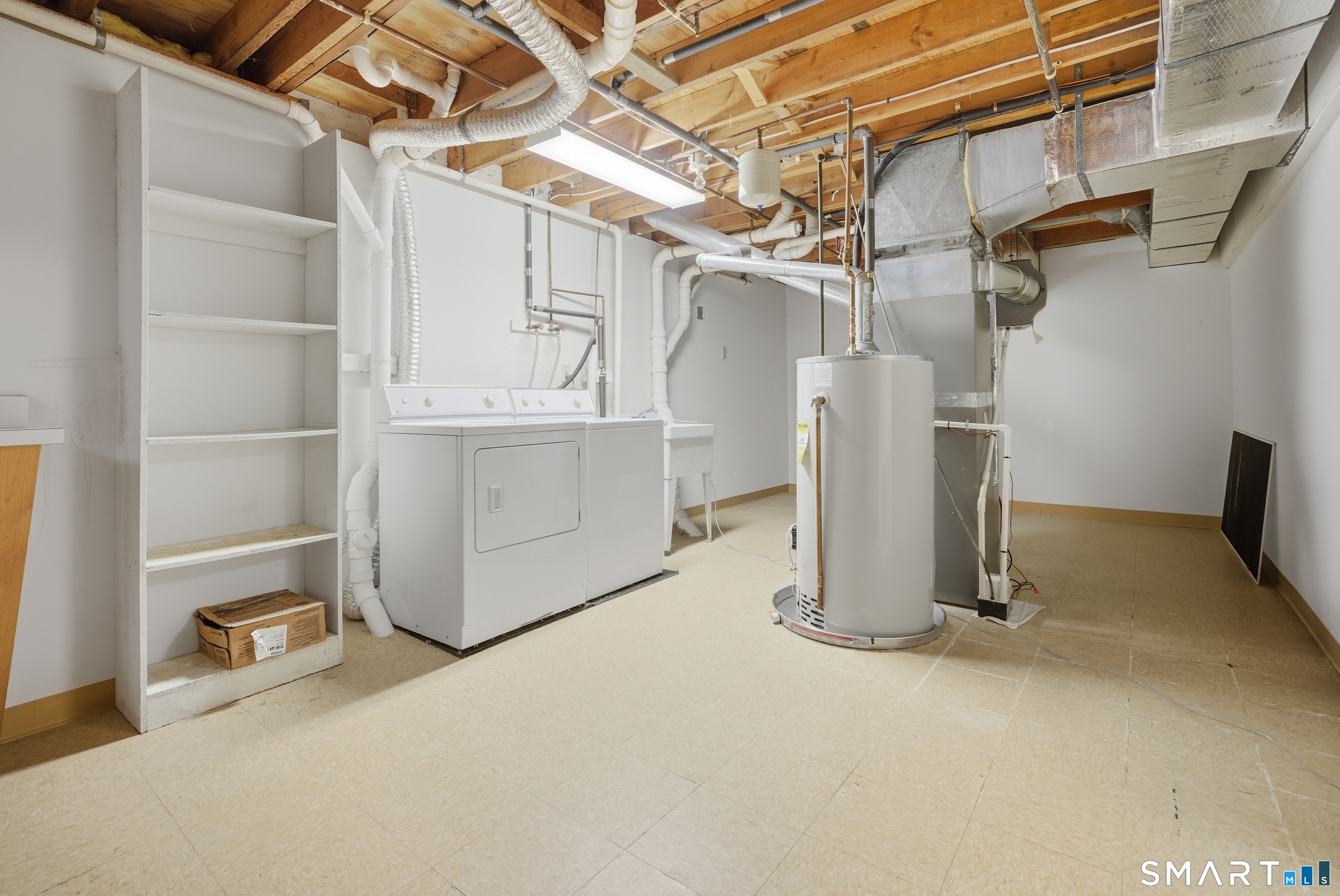 449 South Main Street, Unit 90 Manchester, CT 06040 - Photo 34 of 39 a view of a room with rack on the wall