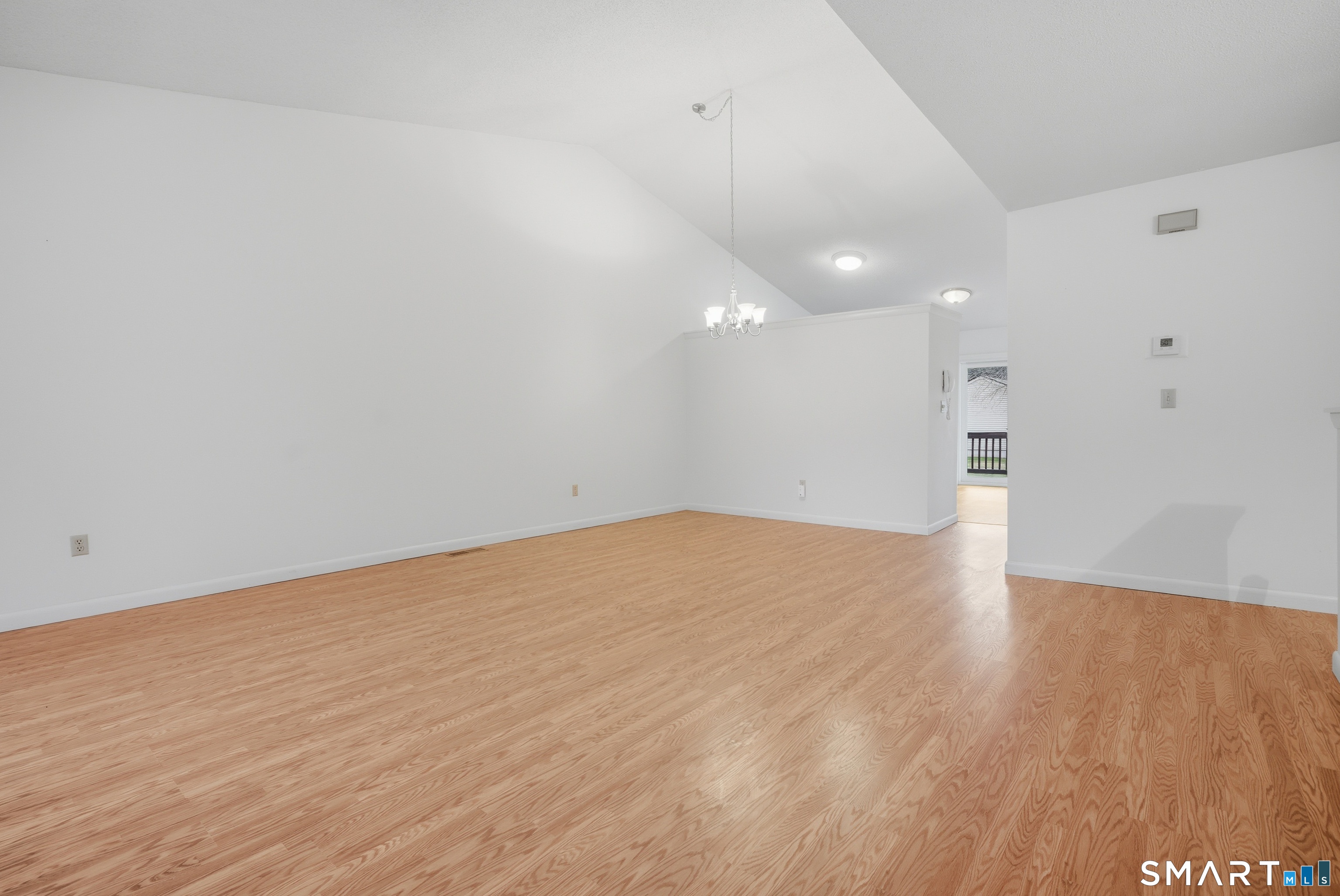 449 South Main Street, Unit 90 Manchester, CT 06040 - Photo 8 of 39 a view of empty room with wooden floor