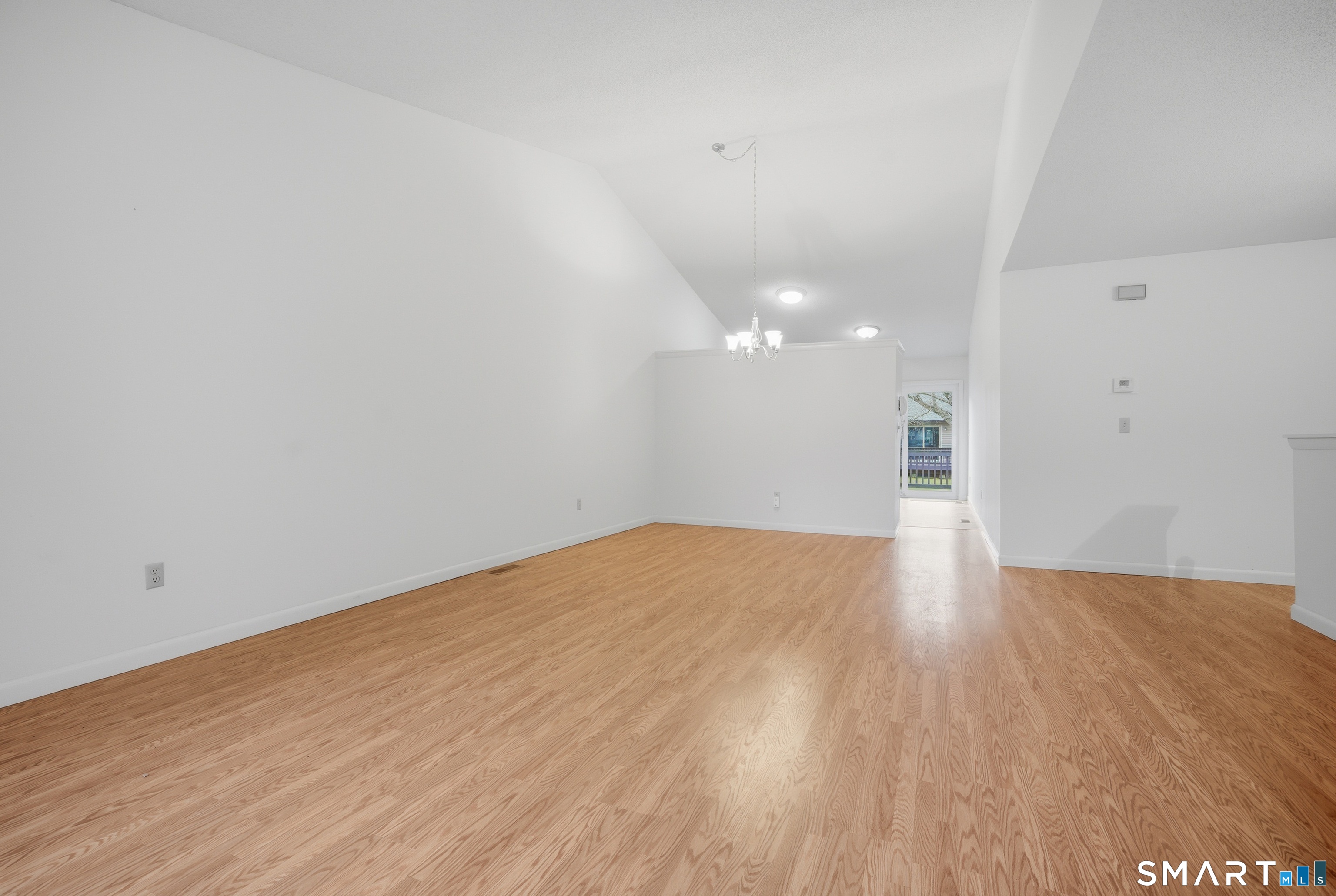 449 South Main Street, Unit 90 Manchester, CT 06040 - Photo 10 of 39 a view of empty room with wooden floor