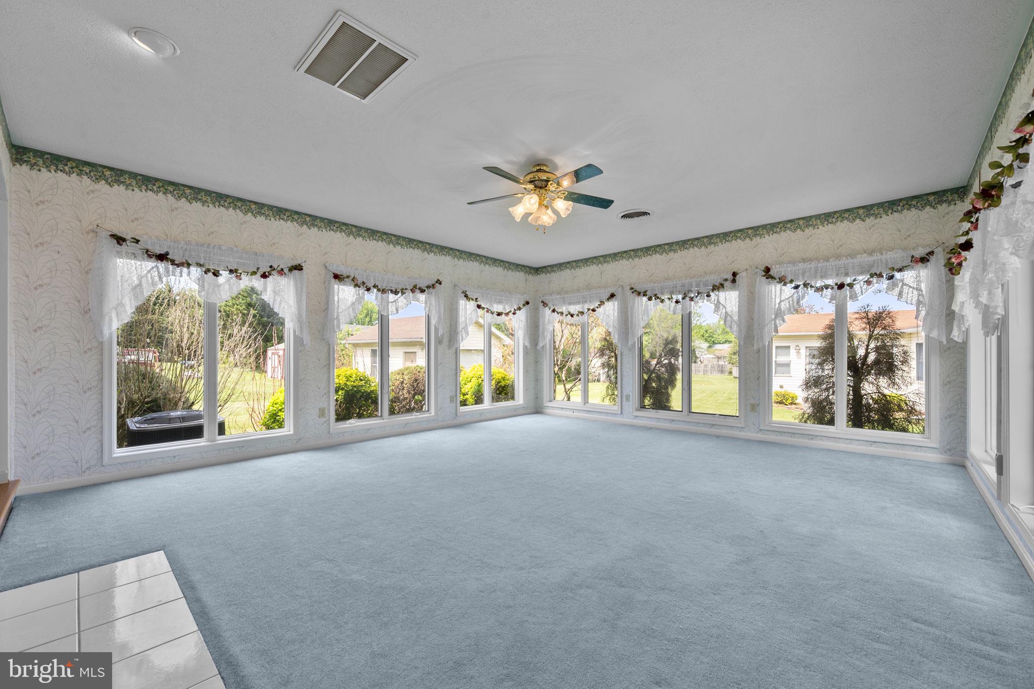 109 Rockbridge Road Stephens City, VA 22655 - Photo 12 of 52 Sunroom with wall-to-wall windows