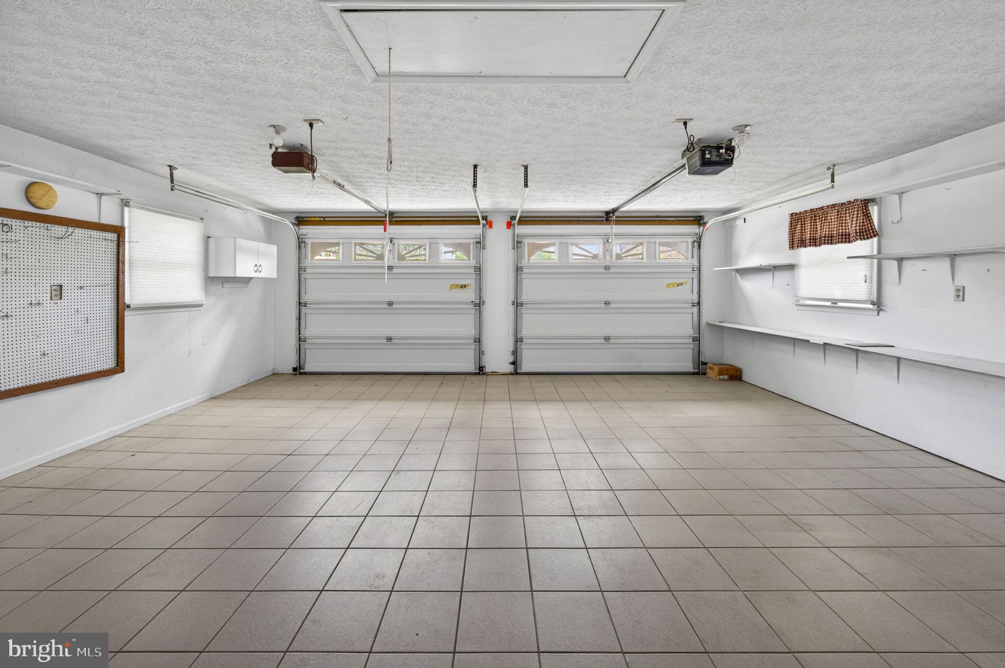 109 Rockbridge Road Stephens City, VA 22655 - Photo 37 of 52 Inside the attached garage w/ built-in shelving