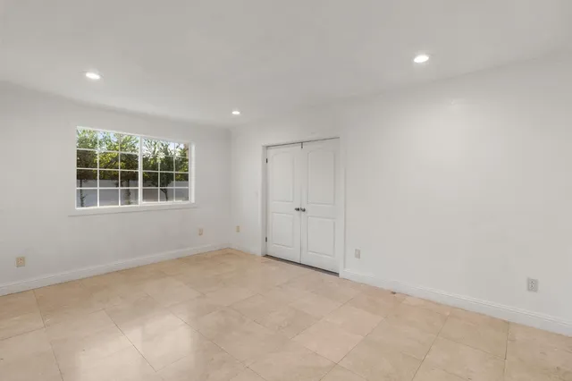 an empty room with windows