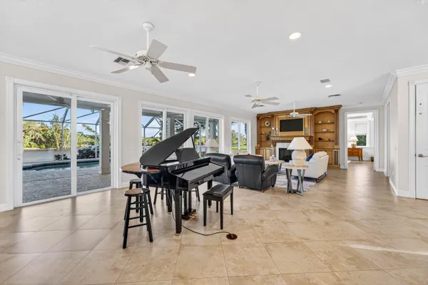 a living room with furniture and view of living room