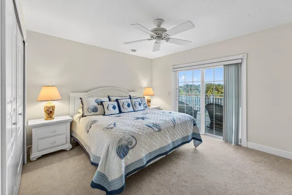 a view of a lake with houses in the back