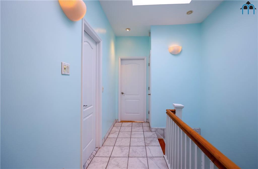 8909 Ridge Boulevard Brooklyn, NY 11209 - Photo 15 of 31 a view of a hallway