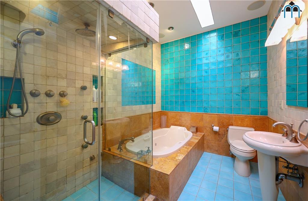 8909 Ridge Boulevard Brooklyn, NY 11209 - Photo 20 of 31 a bathroom with a sink and a shower