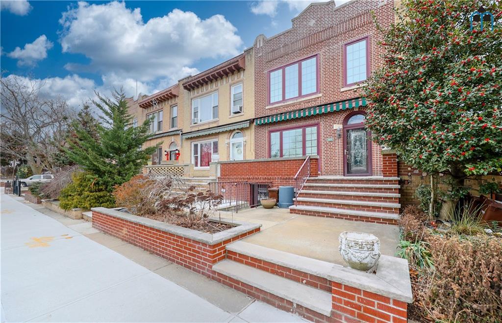 8909 Ridge Boulevard Brooklyn, NY 11209 - Photo 4 of 31 a front view of a house with garden