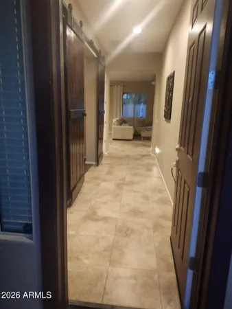 a view of hallway with stairs