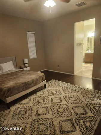 a bathroom with a sink a mirror and a bathtub