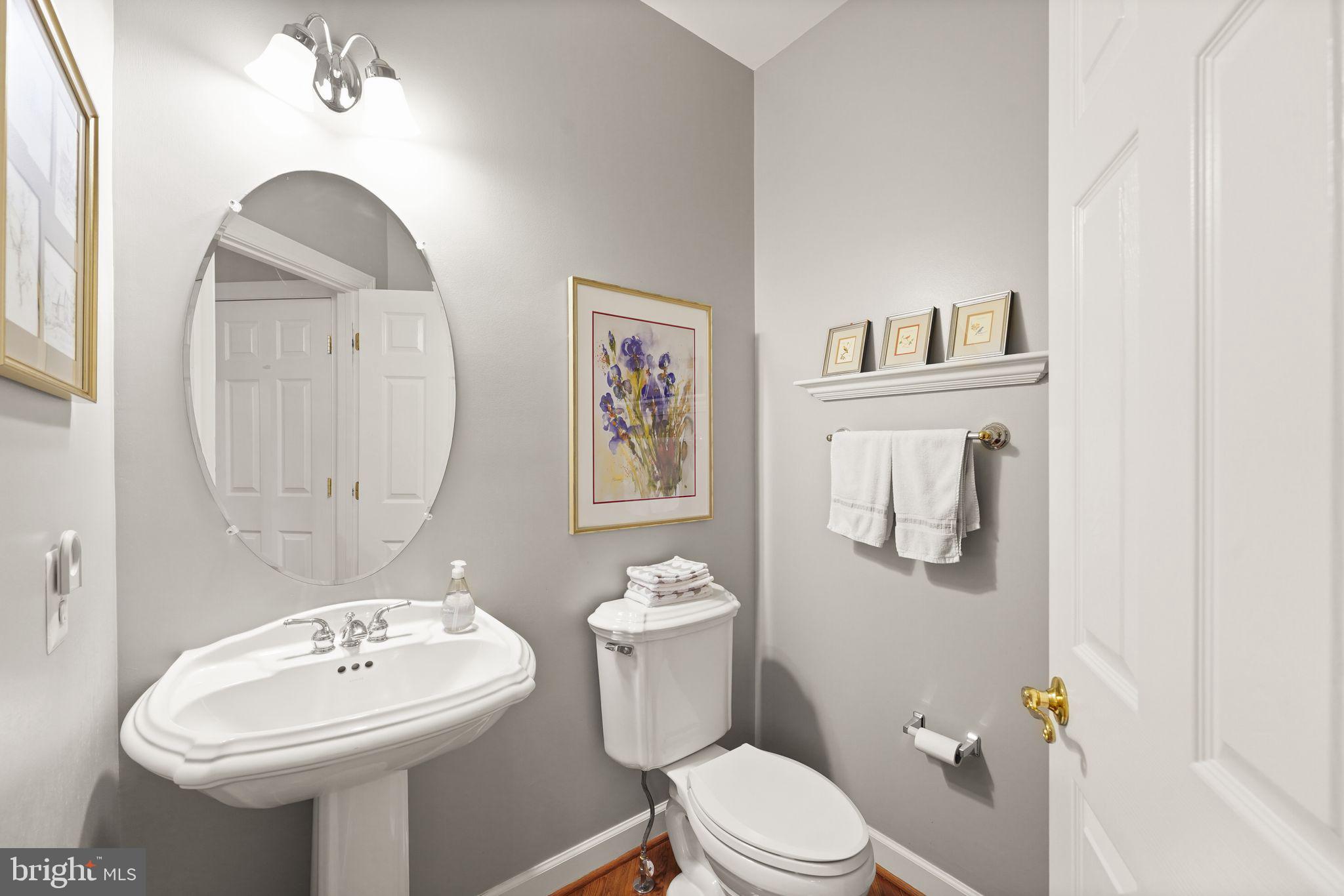 6651 Avignon Boulevard Falls Church, VA 22043 - Photo 11 of 51 a bathroom with a toilet sink and mirror