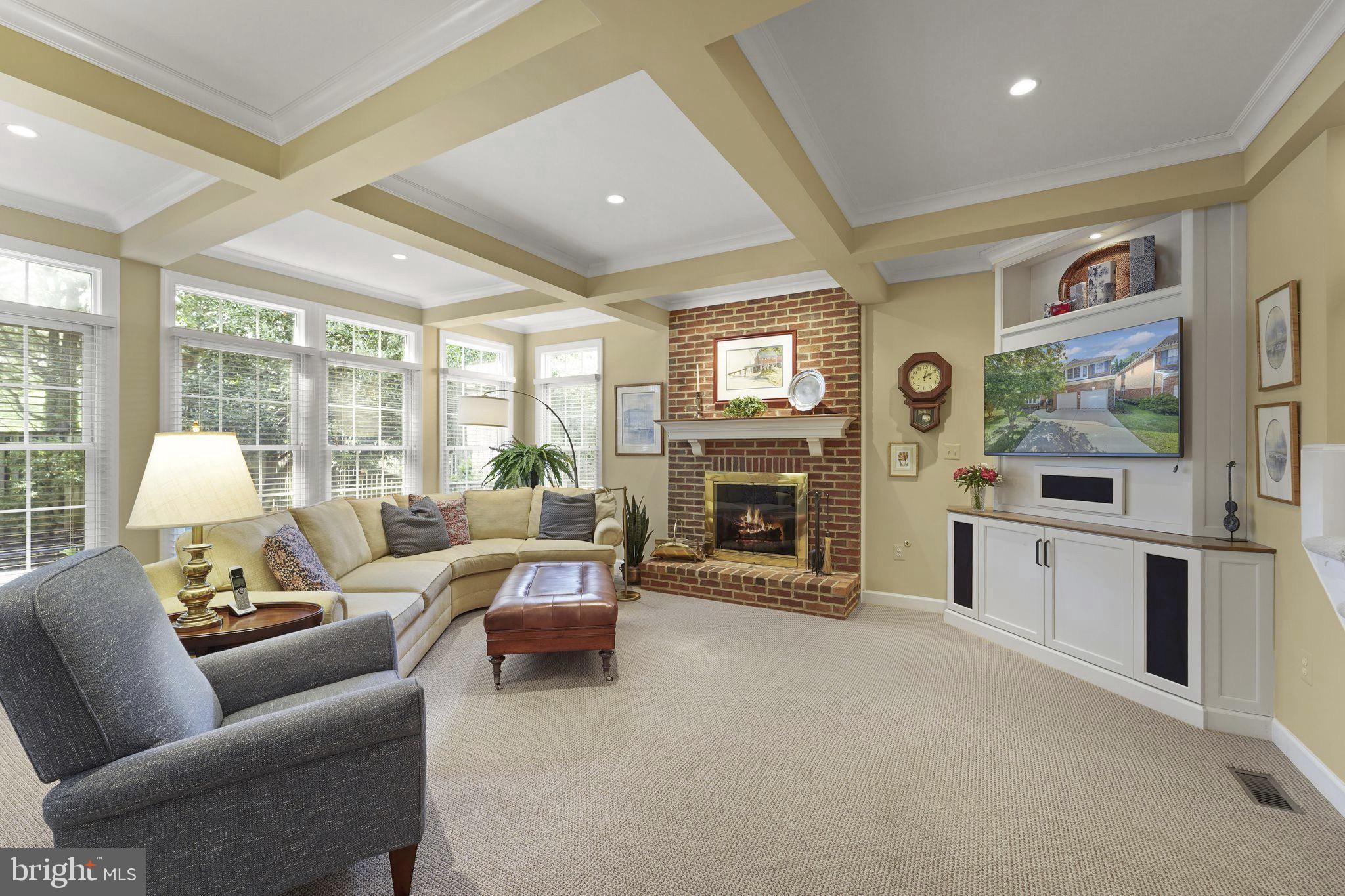 6651 Avignon Boulevard Falls Church, VA 22043 - Photo 13 of 51 a living room with furniture a fireplace and a flat screen tv