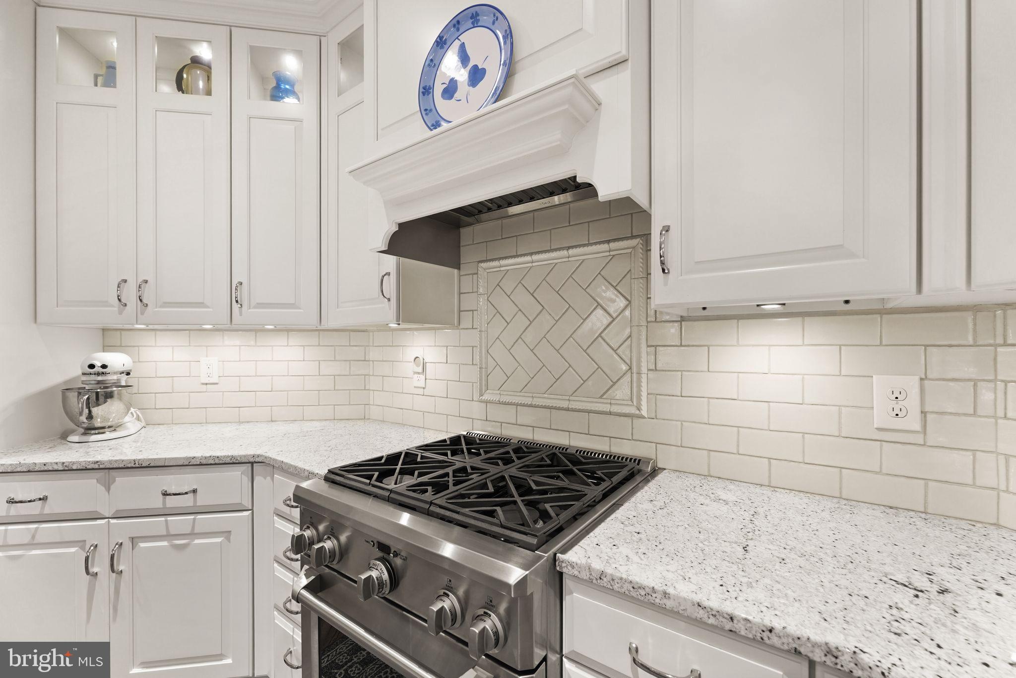 6651 Avignon Boulevard Falls Church, VA 22043 - Photo 16 of 51 a stove top oven sitting inside of a kitchen