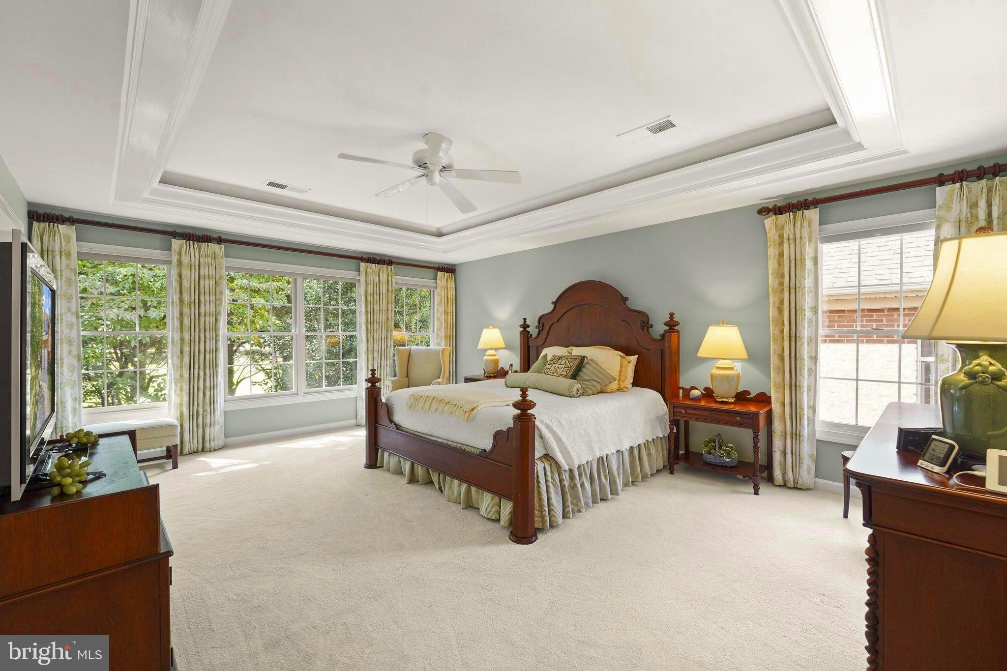 6651 Avignon Boulevard Falls Church, VA 22043 - Photo 20 of 51 a spacious bedroom with a bed and large windows