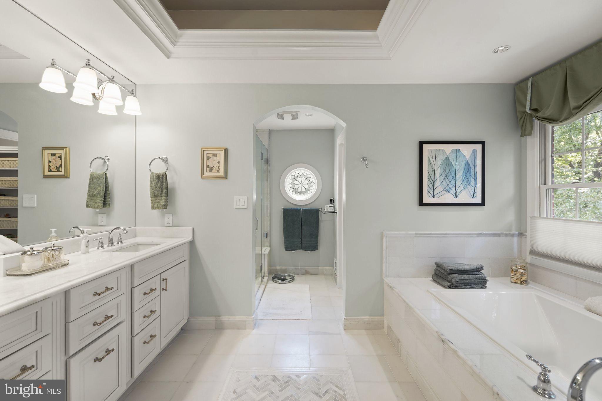 6651 Avignon Boulevard Falls Church, VA 22043 - Photo 24 of 51 a bathroom with a tub sink and mirror