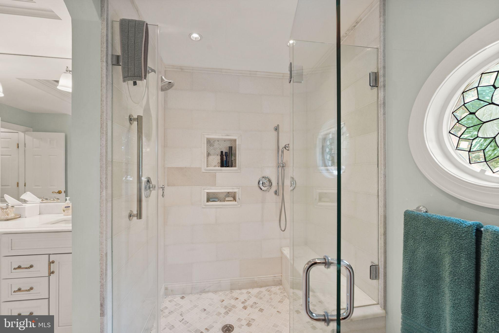 6651 Avignon Boulevard Falls Church, VA 22043 - Photo 27 of 51 a bathroom with a granite countertop sink a shower and a mirror