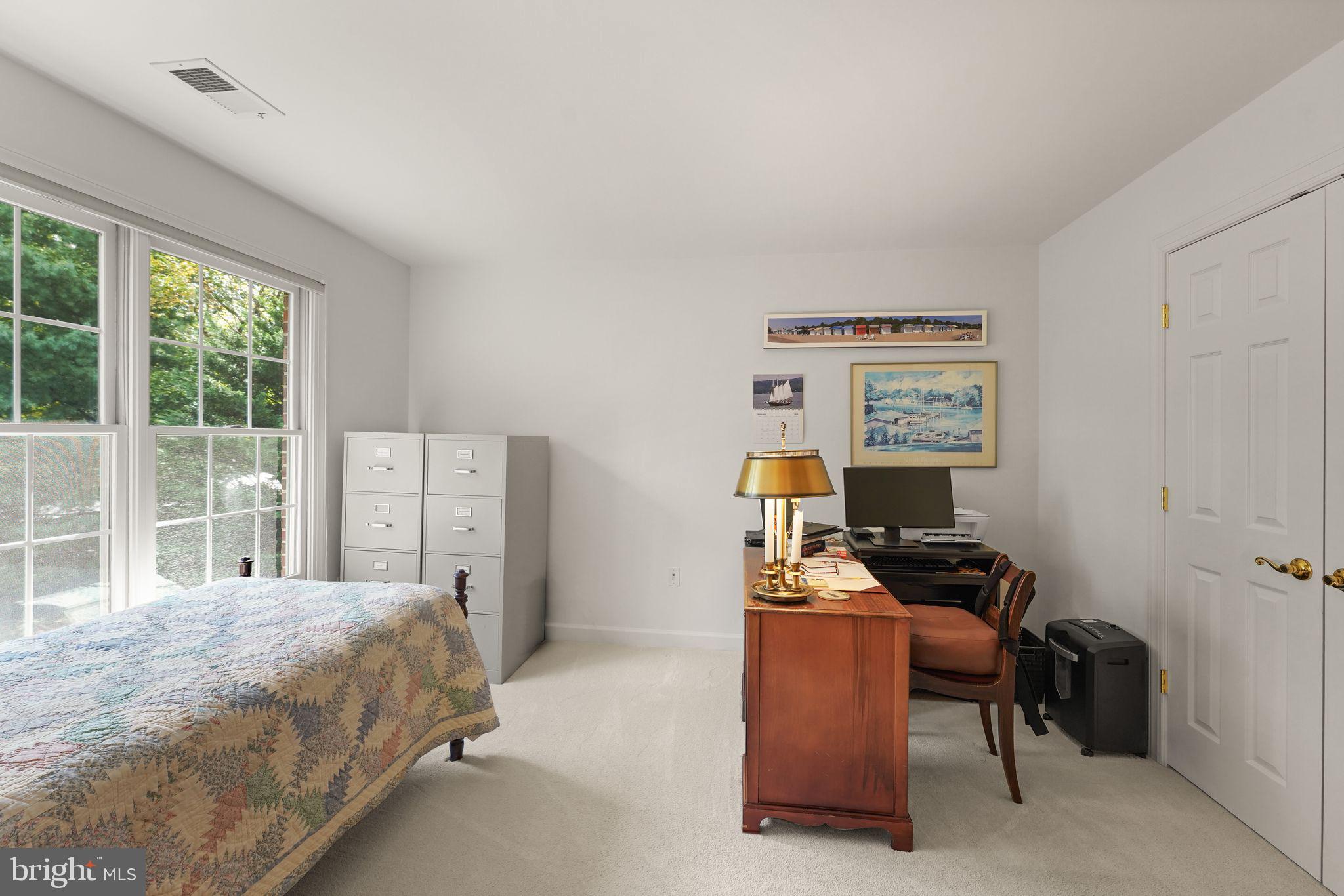 6651 Avignon Boulevard Falls Church, VA 22043 - Photo 32 of 51 a bedroom with a bed and a window