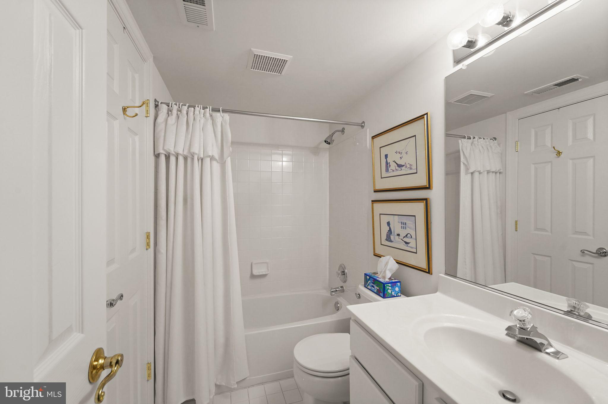 6651 Avignon Boulevard Falls Church, VA 22043 - Photo 39 of 51 a bathroom with a sink toilet and shower