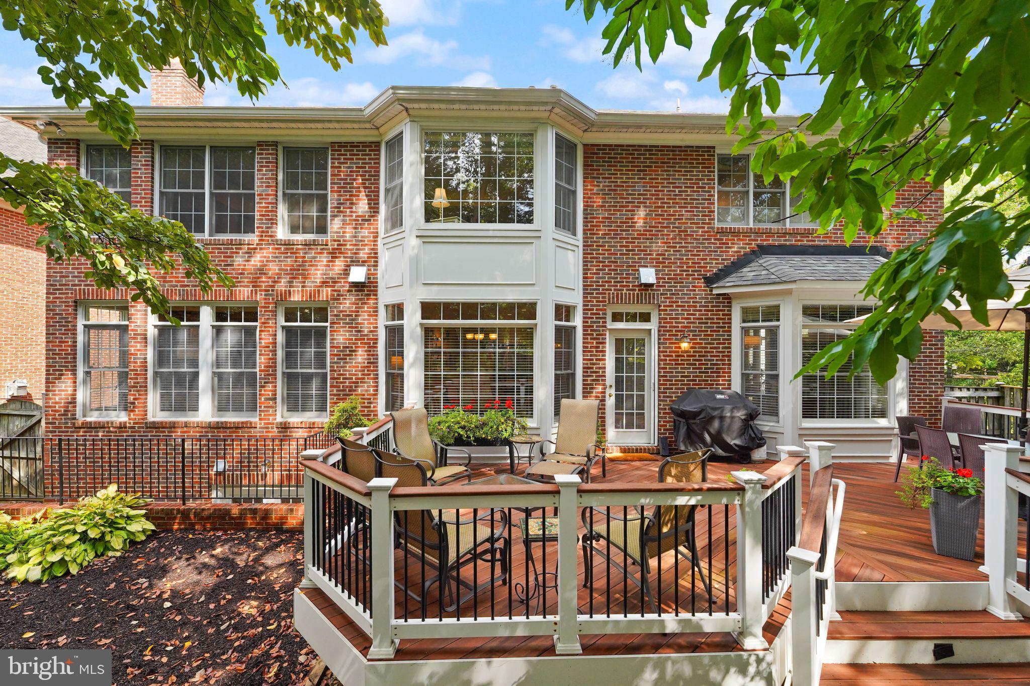 6651 Avignon Boulevard Falls Church, VA 22043 - Photo 45 of 51 a view of house with a chairs and table in a patio