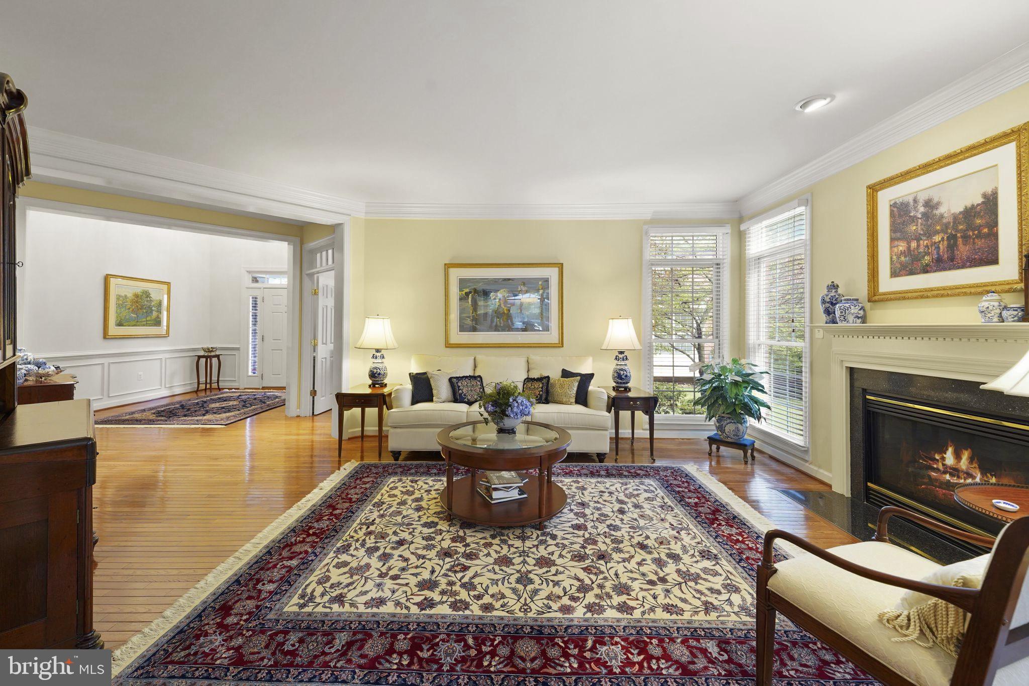 6651 Avignon Boulevard Falls Church, VA 22043 - Photo 6 of 51 a living room with furniture a window and a fireplace