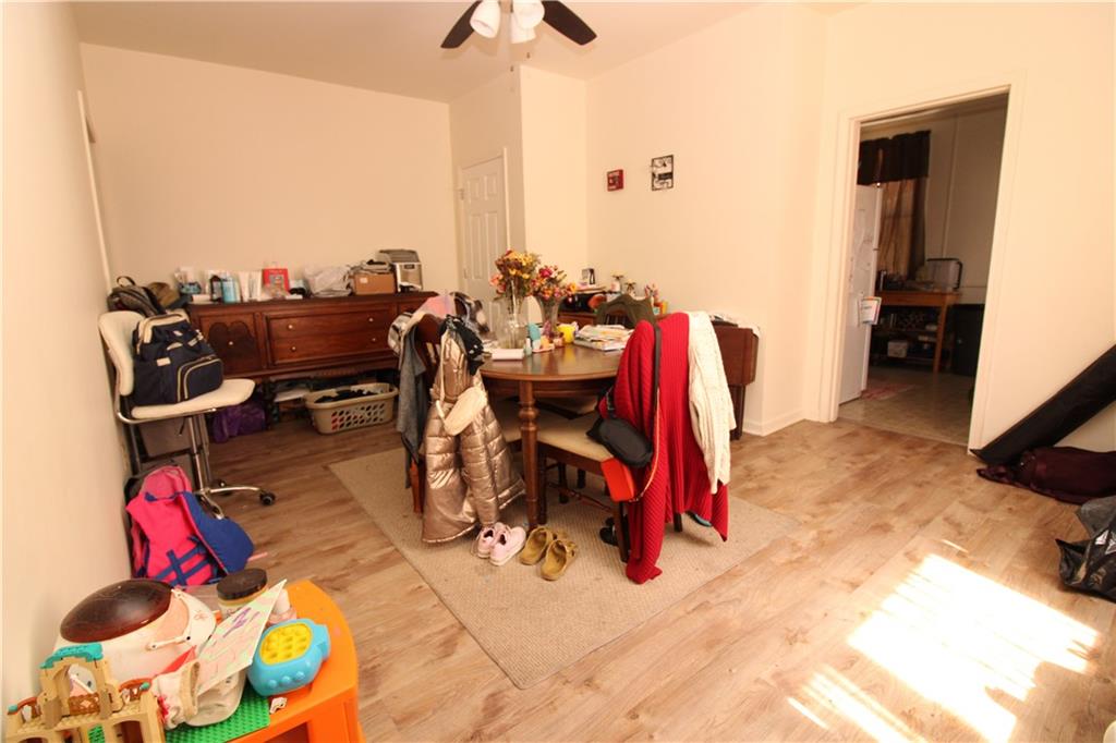 120 Greydon Avenue McKees Rocks, PA 15136 - Photo 8 of 15 a view of walk in closet with clothes and shoes