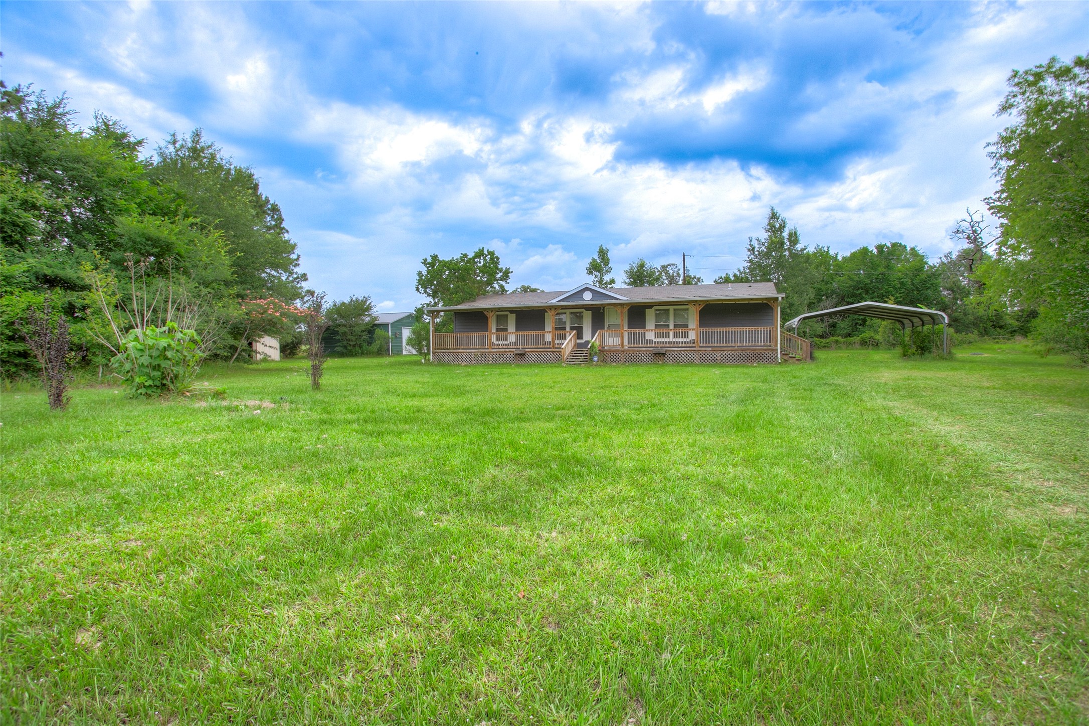 176 Low Keels Road Trinity, TX 75862 - Photo 1 of 46 a view of a house with a big yard