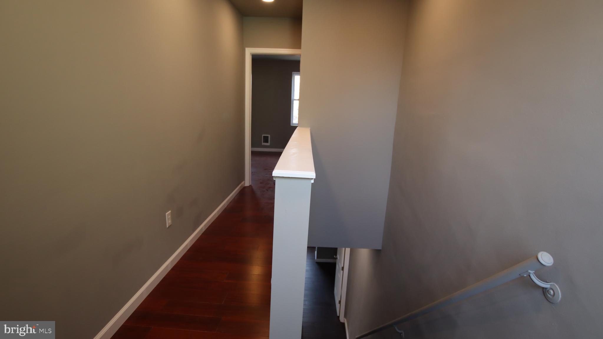 4932 West Thompson Street, Unit 2 Philadelphia, PA 19131 - Photo 17 of 24 a view of entryway and hall with wooden floor