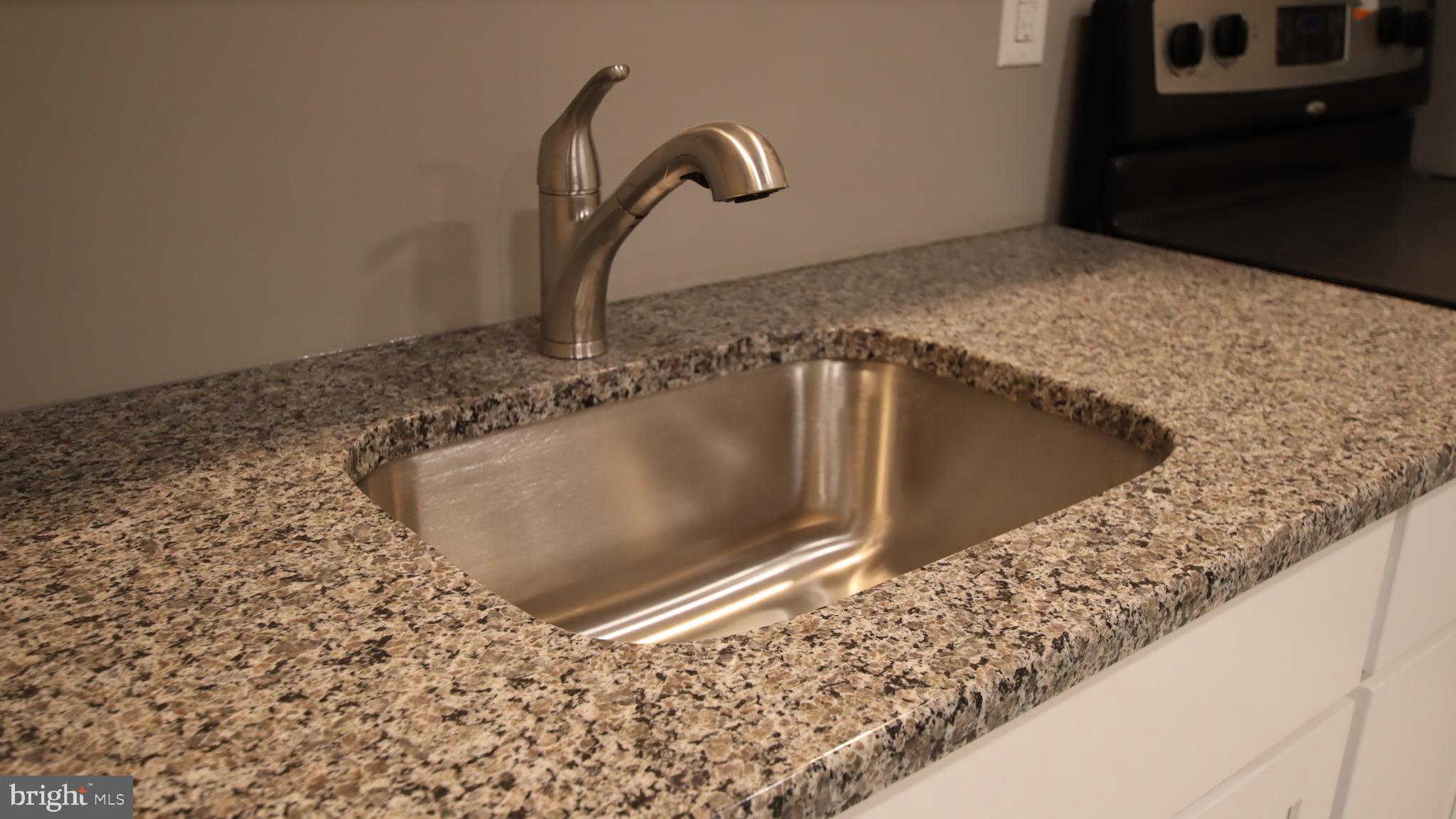 4932 West Thompson Street, Unit 2 Philadelphia, PA 19131 - Photo 4 of 24 a close view of sink