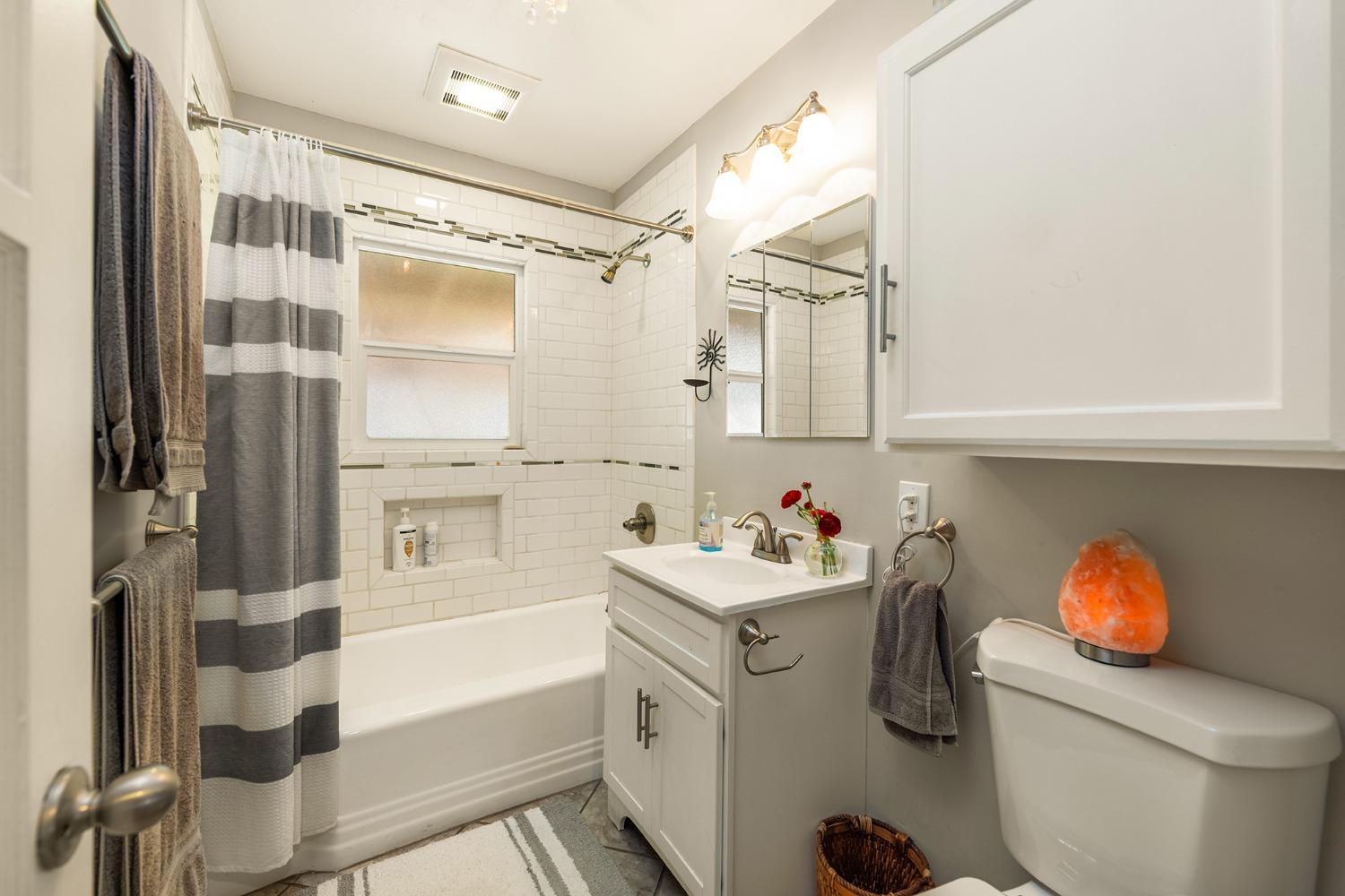 302 Bald Street Ojai, CA 93023 - Photo 13 of 38 a bathroom with a sink a toilet and shower