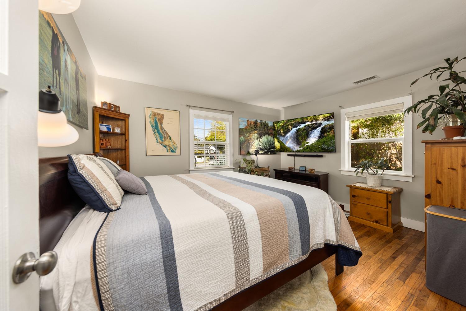 302 Bald Street Ojai, CA 93023 - Photo 14 of 38 a bedroom with a large bed and a large window