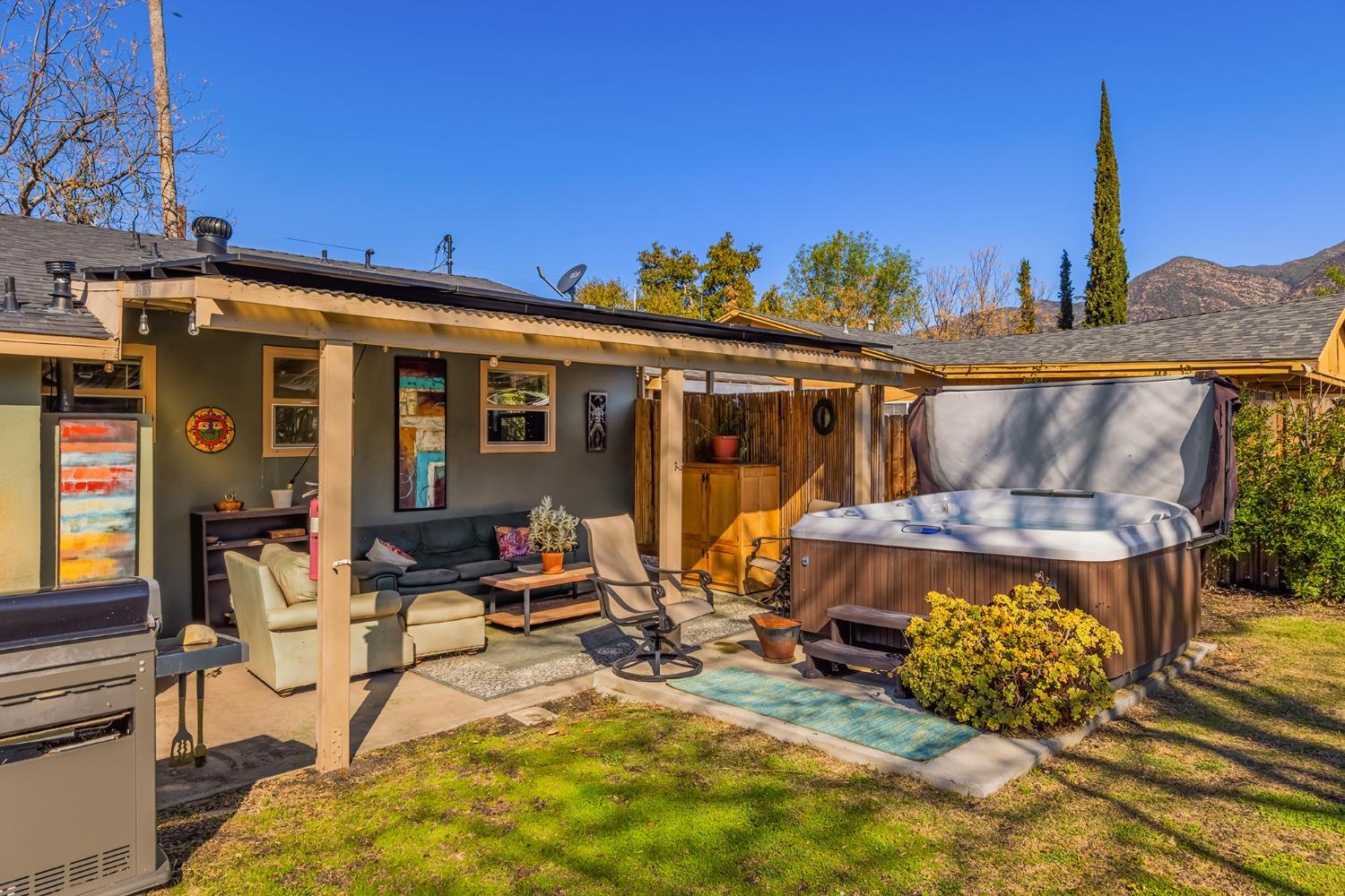 302 Bald Street Ojai, CA 93023 - Photo 23 of 38 a view of a patio with chairs and tables