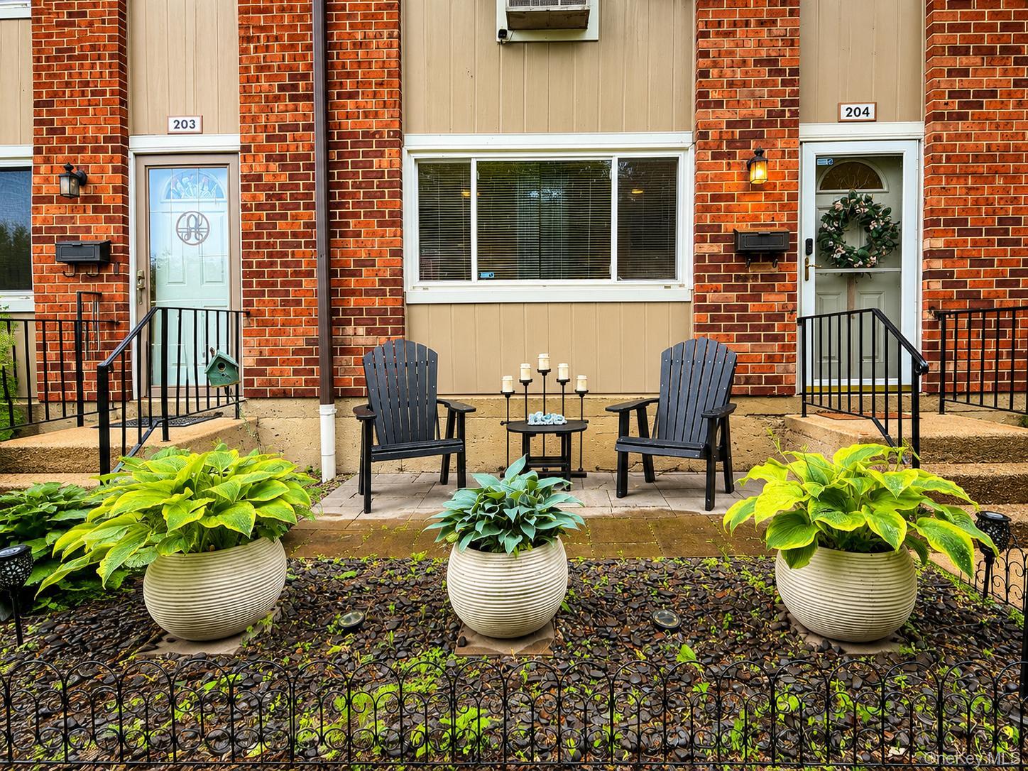 204 Old Country Road Elmsford, NY 10523 - Photo 1 of 13 A welcoming front garden creates the comfort & curb appeal of private home living.