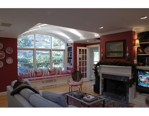 37 Thackeray Road Wellesley, MA 02481 - Photo 5 of 8 a living room with furniture a fireplace and a flat screen tv