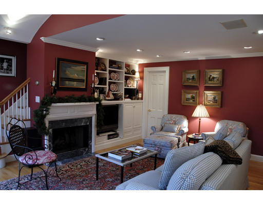 37 Thackeray Road Wellesley, MA 02481 - Photo 6 of 8 a living room with furniture a flat screen tv and a fireplace